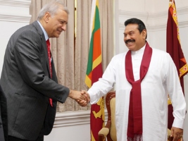 Mahinda Rajapaksa, the current Commonwealth Chair-in-Office, welcomes Commonwealth Secretary-General Mr. Kamalesh Sharma at Temple Trees, Oct. 27, 2014. (Photo by : Nalin Hewapathirana)